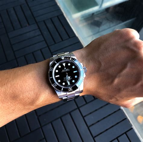 rolex sub on wrist